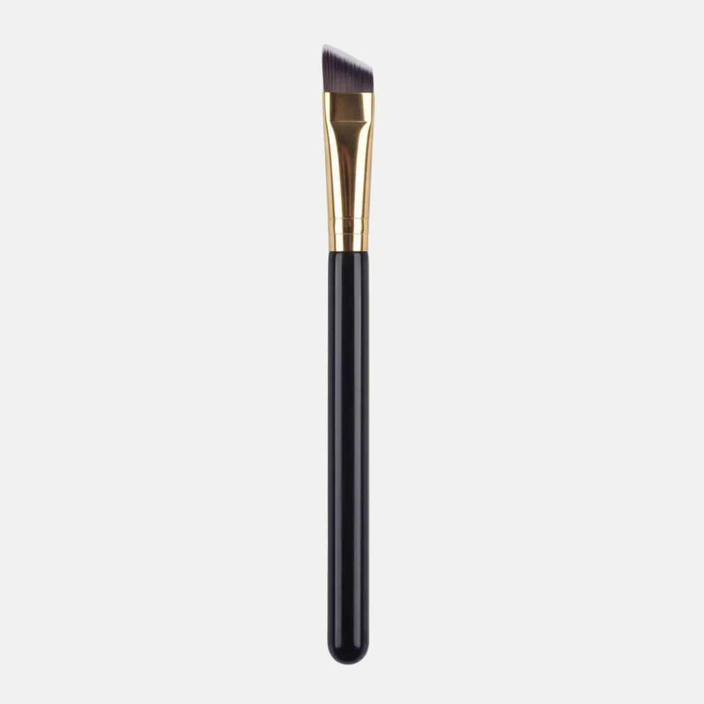 MEDAIONE angled eyebrow brush with black handle and gold ferrule, ideal for precise brow makeup application.